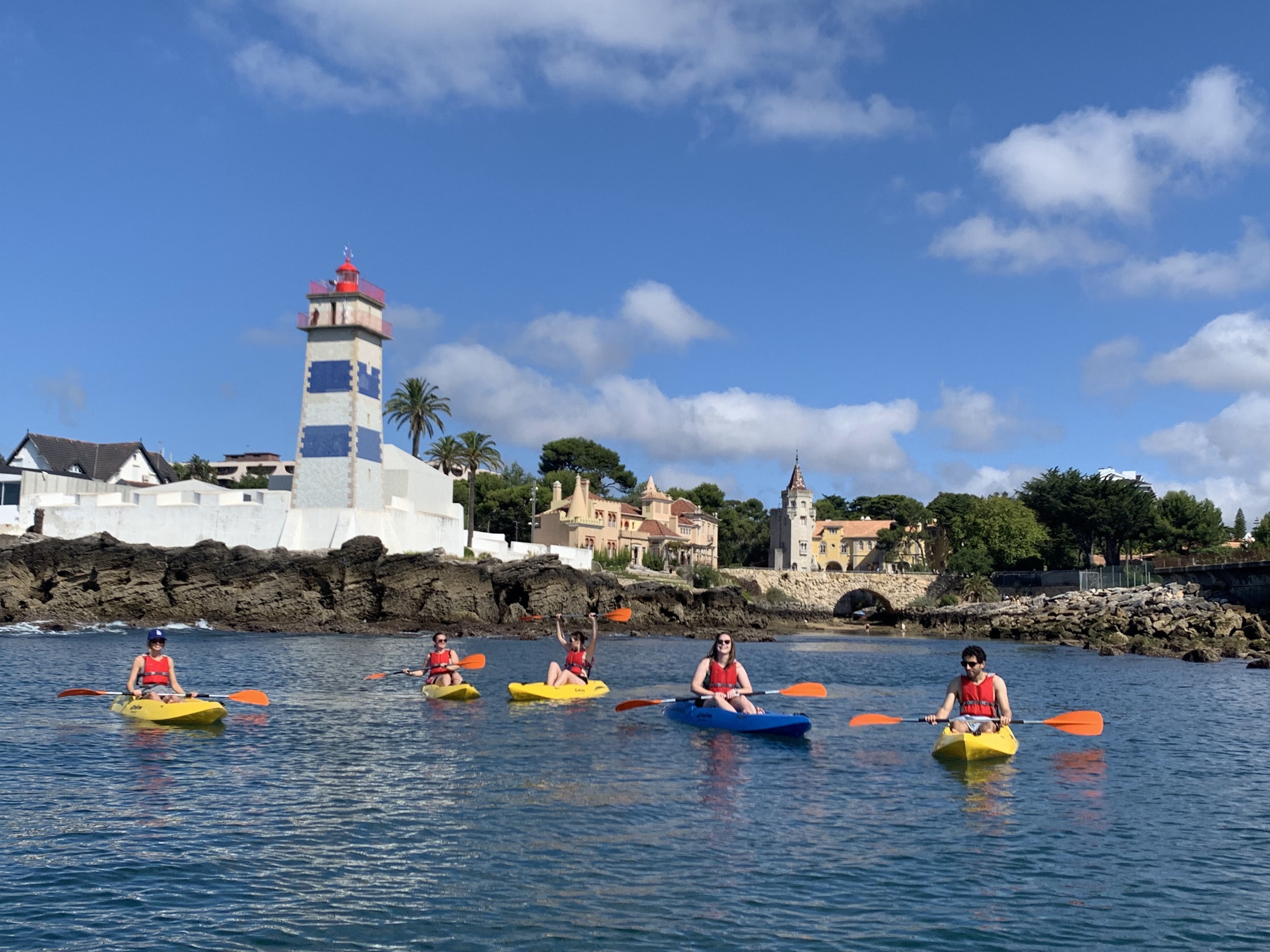 Group kayaking near the Santa Marta lighthouse, Cascais